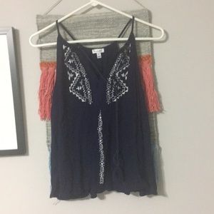 Navy tank top with white pattern and tassels